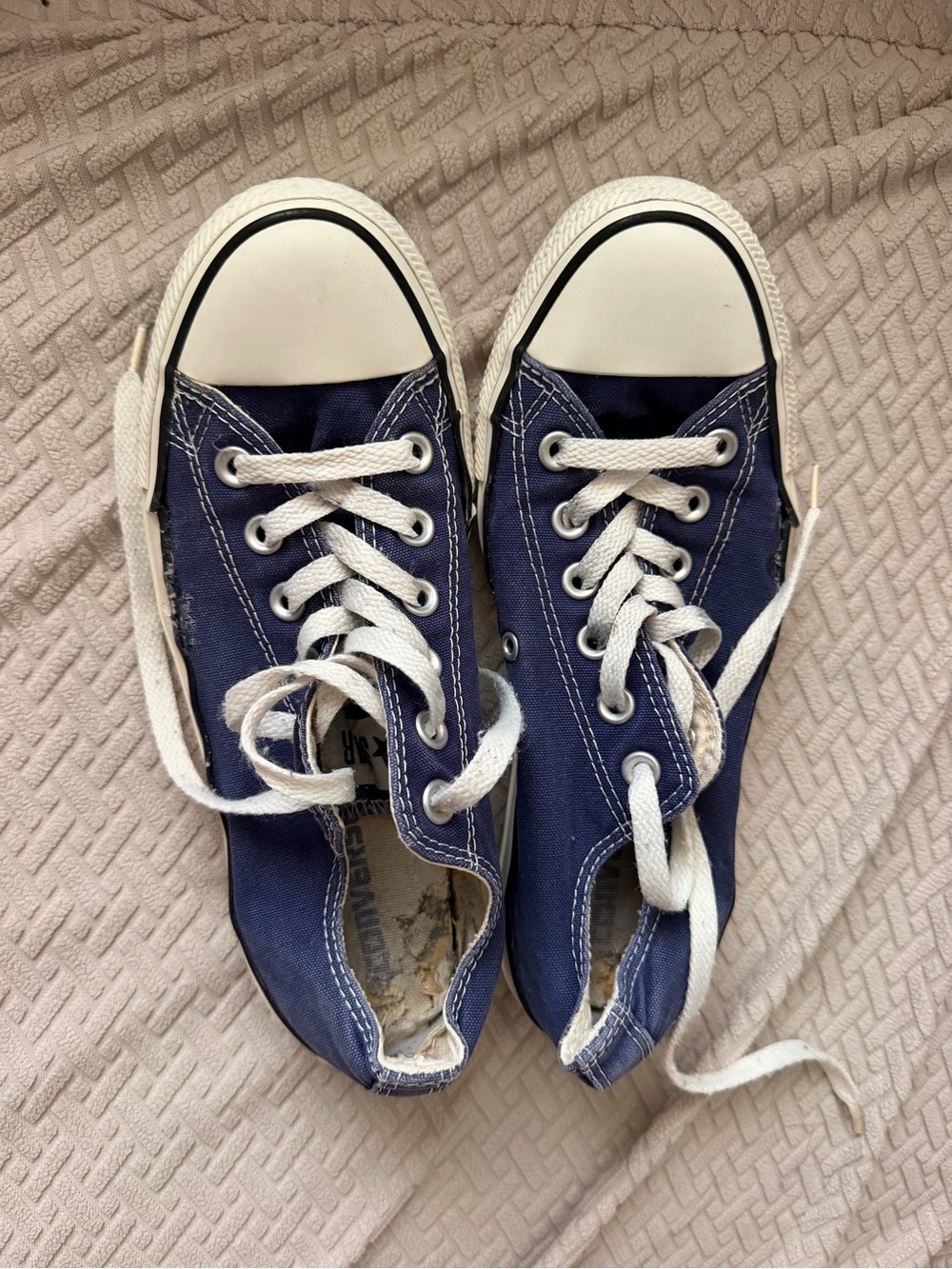 Converse women’s Low-Top Sneakers in Navy and White